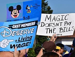 Disneyland workers threaten strike action over wages, treatment