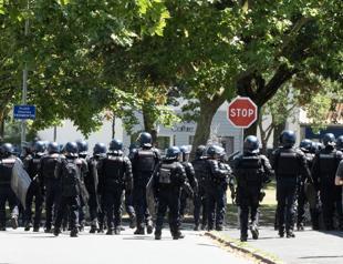 French police clash with water demonstrators after port blockade