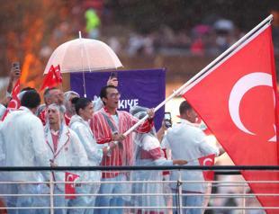 Colorful river parade launches Paris Olympics