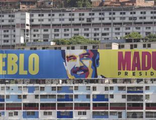 Tense Venezuela votes in shadow of bloodbath warning