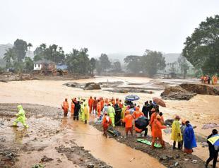 India landslide toll hits 122 as rain hampers rescue work