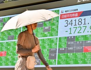 Tokyos Nikkei dives 12.4%, suffers record points loss