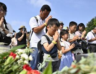Hiroshima remembers A-bomb victims as global tragedies unfold