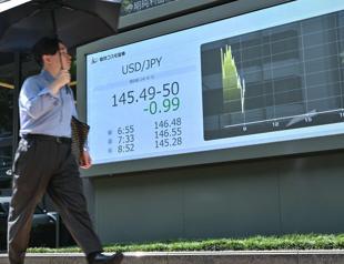 Bank of Japan says it will stick with ultra-loose policies