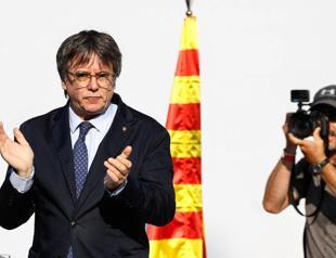 Fugitive Catalan ex-leader returns to Spain and vanishes again