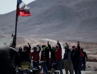 Workers strike at worlds biggest copper mine