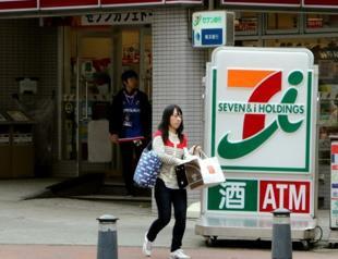 Japanese 7-Eleven owner soars on takeover offer