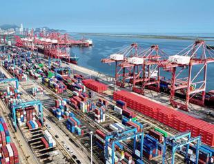 Japan records trade deficit as imports surge