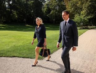 Macron meets Le Pen under pressure to name new PM