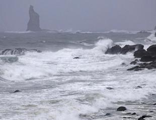 Three missing as extremely strong typhoon nears Japan
