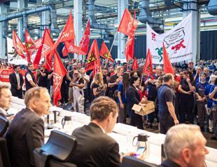 Crisis-hit Volkswagen scraps German job protection deal