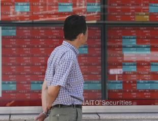 Tokyo stocks plunged on strong yen and PM election