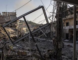 Israeli strikes level buildings across Lebanon