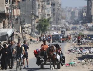 Rescuers say halting work in north Gaza after Israel threats