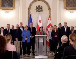 Georgia opposition calls election results protests as president accuses Russia