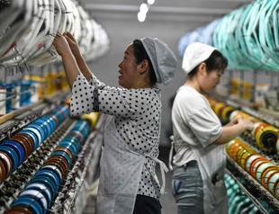 China factory output expands for first time in six months