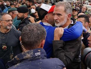 Crowds hurl mud at Spanish king on visit to flood disaster town