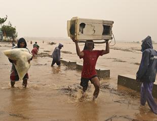 Thousands flee as fourth typhoon in a month hits Philippines