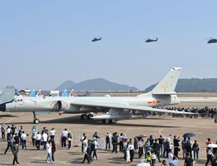 Chinas largest air show starts with fighter jets, attack drones