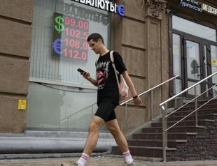 Russias growth dips as inflation weighs on economy