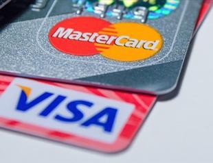 Competition authority launches probe into Mastercard, Visa