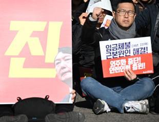 South Korean president clings to power after martial law U-turn