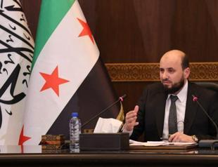 New Syria PM calls for stability and calm