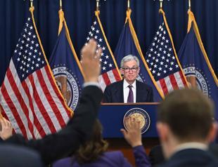 US Fed cuts key rate a quarter point and signals fewer cuts ahead