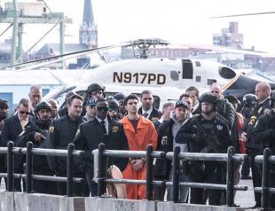 Suspect in health CEO killing charged with murder in New York