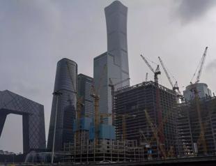 China says to raise deficit, boost spending next year