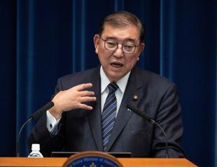 Japan approves record budget for ageing population, defense