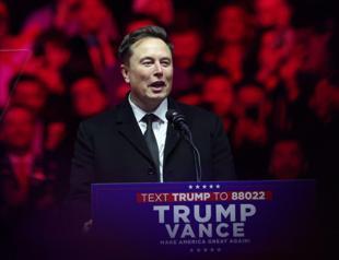 Top Beijing official urges Musk to deepen ties with China