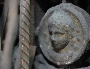 Priests pursue historic door with Virgin Mary figure