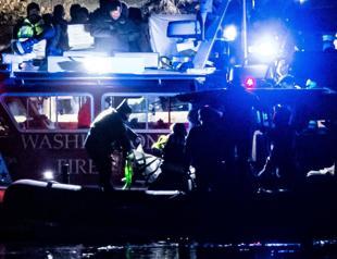 67 feared dead after plane collides with helicopter in US