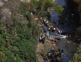 At least 55 dead after Guatemala bus plunges into ravine
