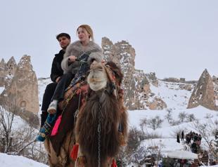 Tourists turn to camels as weather grounds balloons in Cappadocia