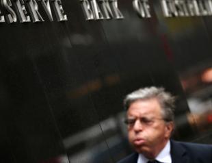 Australian central bank cuts rates for first time since 2020