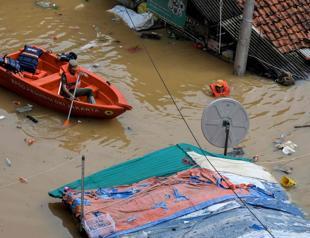 Evacuations as torrential rains flood Jakarta