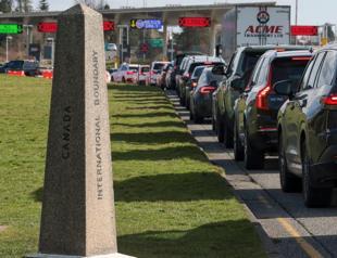 Trump pauses tariffs for autos as Trudeau call yields no breakthrough