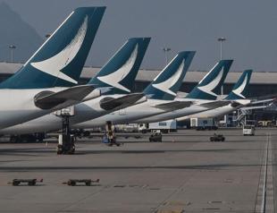 Cathay Pacific says its profits edged up to $1.27 bln in 2024
