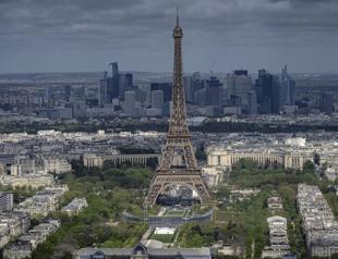 France determined to cut debt as Fitch maintains rating