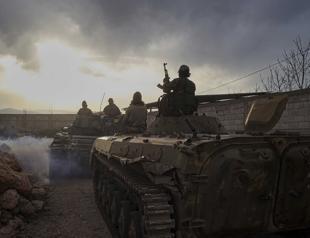 Syria, Lebanon agree to withdraw troops from border town after tensions