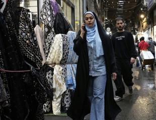 Irans currency falls to record low against the dollar