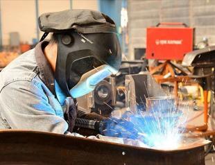 Industrial production down in February