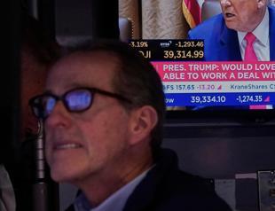 Stocks, dollar hit as Trump admits costs of beautiful trade blitz