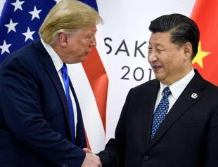 China says door open to trade talks after Trump signals tariffs will fall