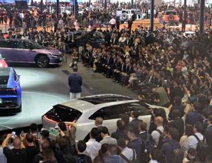 Auto Shanghai showcases new EV era despite tariff speedbumps