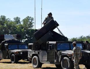 Conflicts spur unprecedented rise in military spending