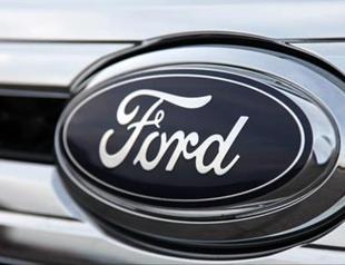 Ford sees $1.5 bln tariff hit this year, suspends 2025 forecast