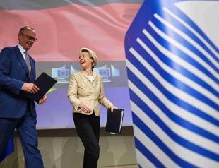 EU chief urges common European solution on migration as Merz visits